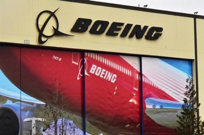 Boeing's logo and painted doors of the factory where it makes 747, 767, 777 and 787 jetliners, in Everett, Washington. 
